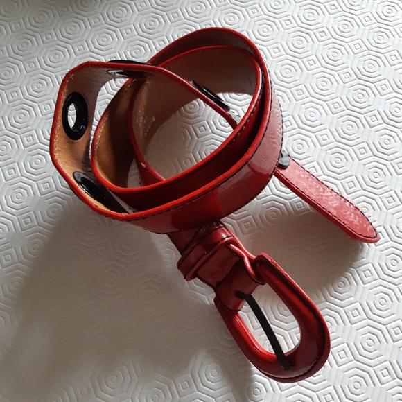 2/25$***Red patent faux leather grommet nelt - Picture 3 of 11